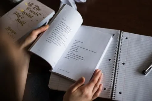 person-flipping-book