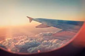 This image has an empty alt attribute; its file name is Plane-Trip.jpg