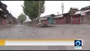 Kashmir remains under curfew following tensions.